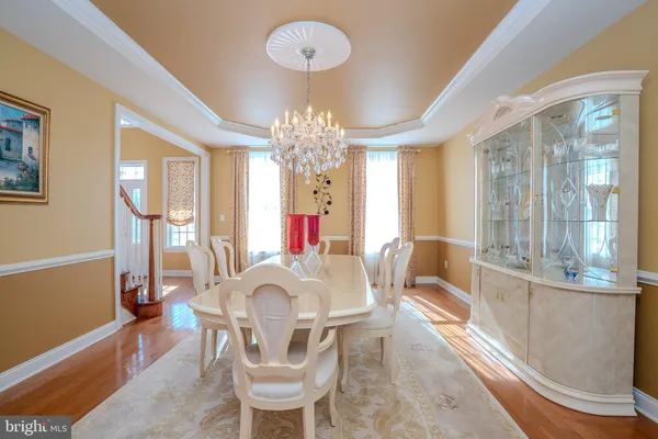 a bathroom with a sink a mirror and a toilet