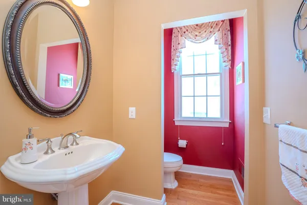 a spacious bedroom with a bed and window