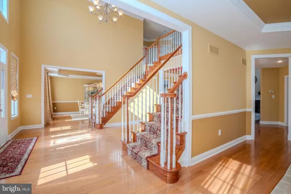 a bathroom with a shower and a glass door