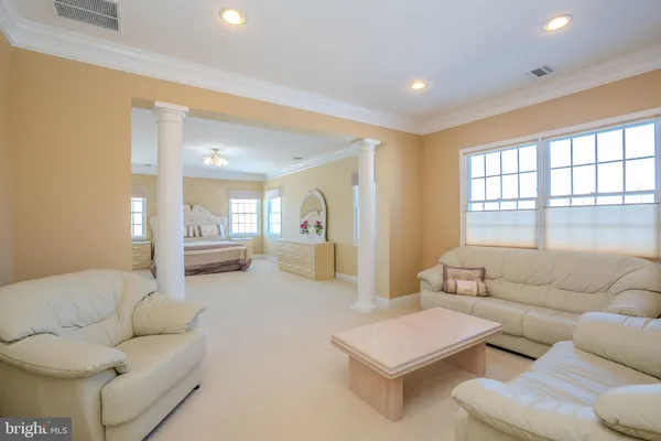 a view of a livingroom with wooden floor