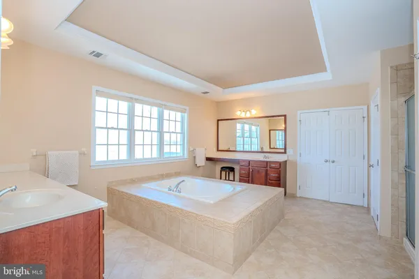 an aerial view of a house with outdoor space