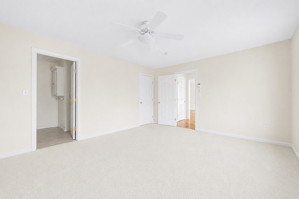 3 Oak View Terrace, Unit 3 Franklin, MA 02038 - Photo 12 of 38 an empty room with a ceiling fan and a window