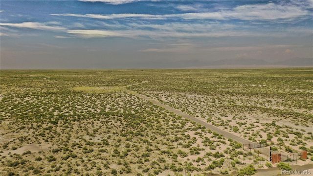 a view of mountains and valleys