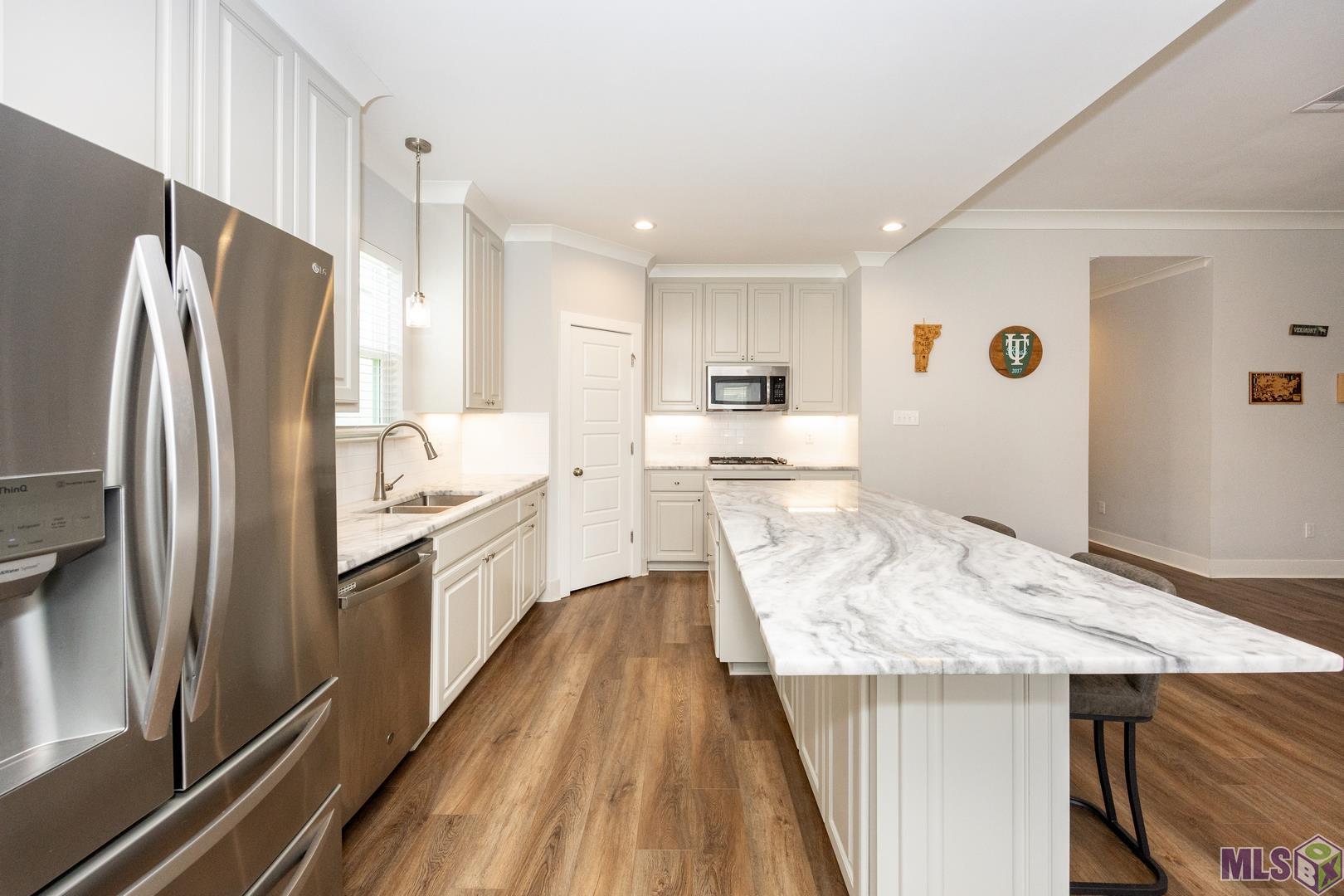 9016 Stonecroft Avenue Baton Rouge, LA 70810 - Photo 14 of 28 kitchen view 2