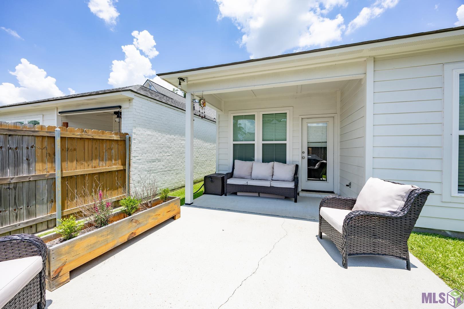 9016 Stonecroft Avenue Baton Rouge, LA 70810 - Photo 3 of 28 extended patio area