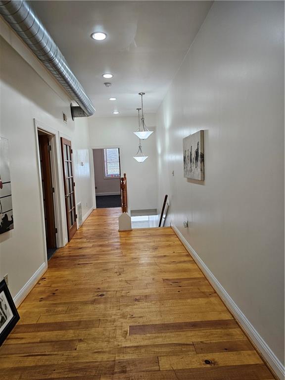 312 Forbes Avenue, Unit 2 Pittsburgh, PA 15222 - Photo 14 of 15 a view of a livingroom with wooden floor