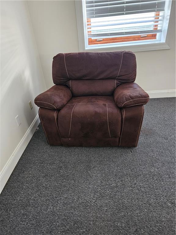 312 Forbes Avenue, Unit 2 Pittsburgh, PA 15222 - Photo 3 of 15 a living room with a couch