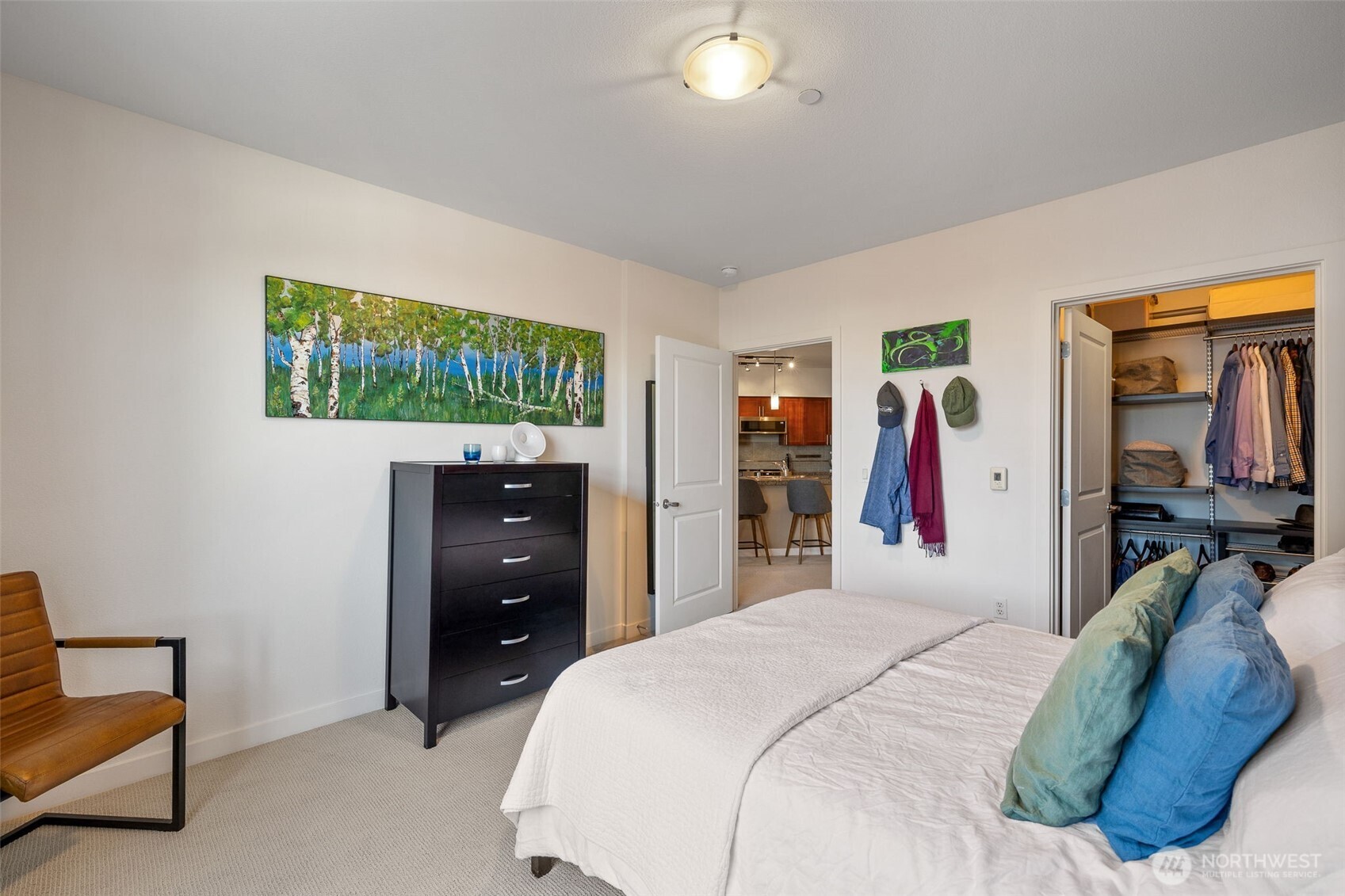 5440 Leary Avenue Northwest, Unit 617 Seattle, WA 98107 - Photo 14 of 28 a bed room with a bed and a television