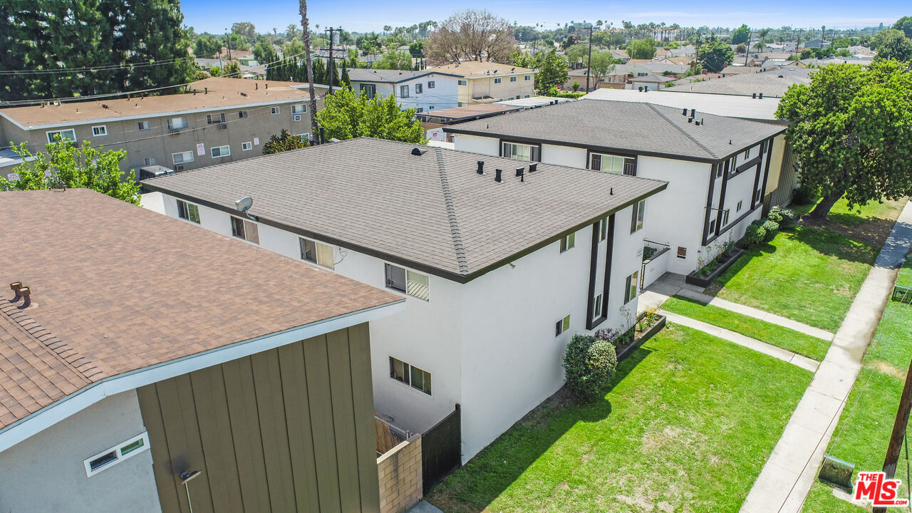 10024 Foster Road Bellflower, CA 90706 - Photo 21 of 29 an aerial view of a house having yard