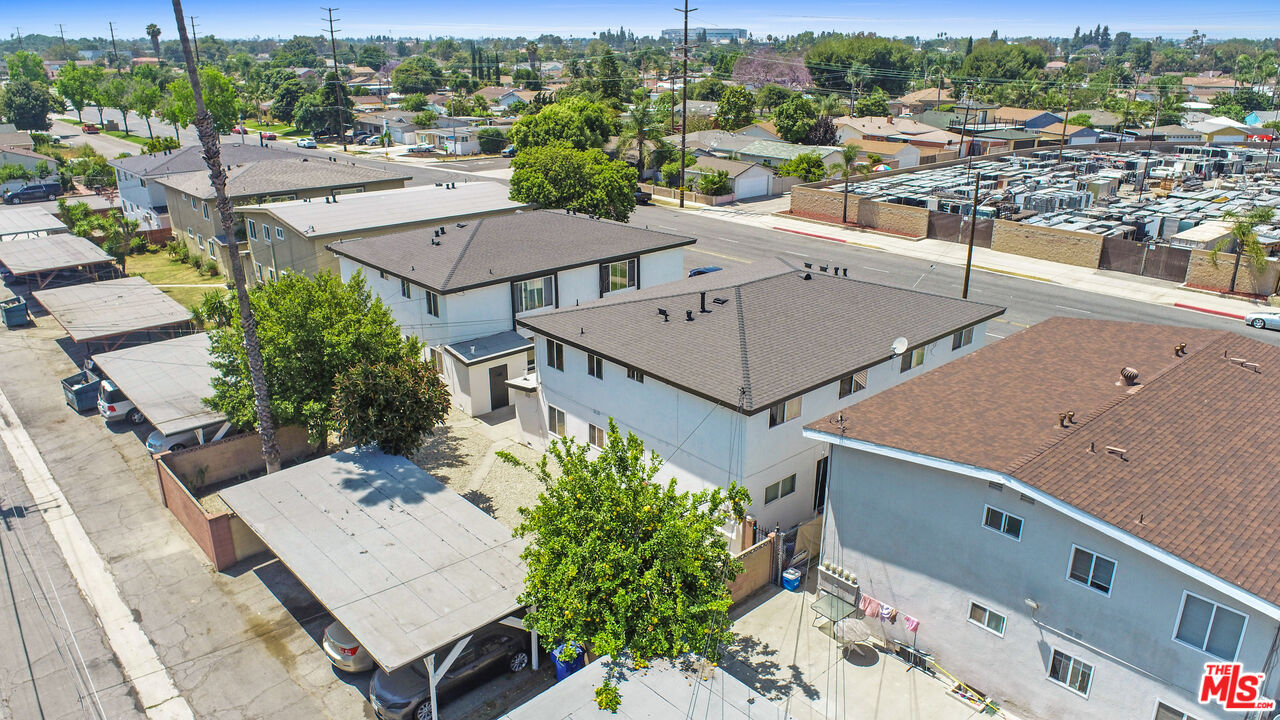 10024 Foster Road Bellflower, CA 90706 - Photo 23 of 29 an aerial view of a house with a yard