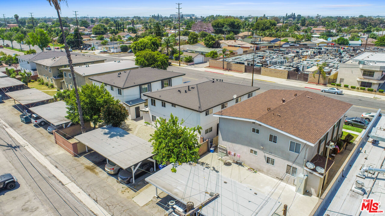 10024 Foster Road Bellflower, CA 90706 - Photo 24 of 29 an aerial view of a house with a yard and lake view