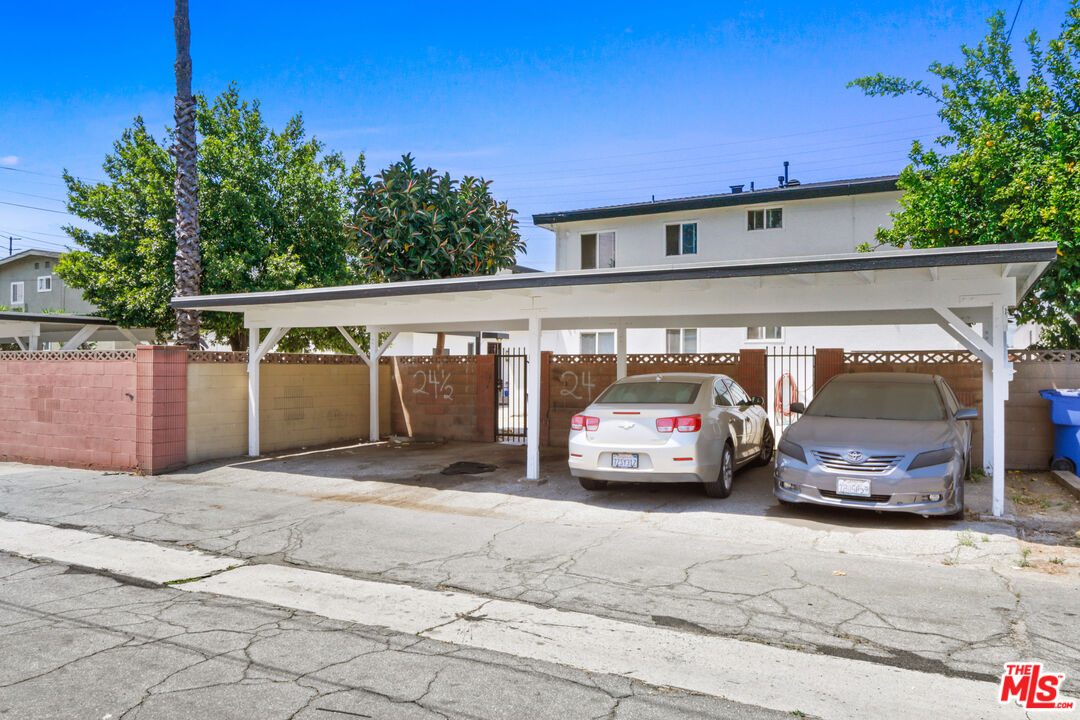 10024 Foster Road Bellflower, CA 90706 - Photo 9 of 29 a view of car parked in parking