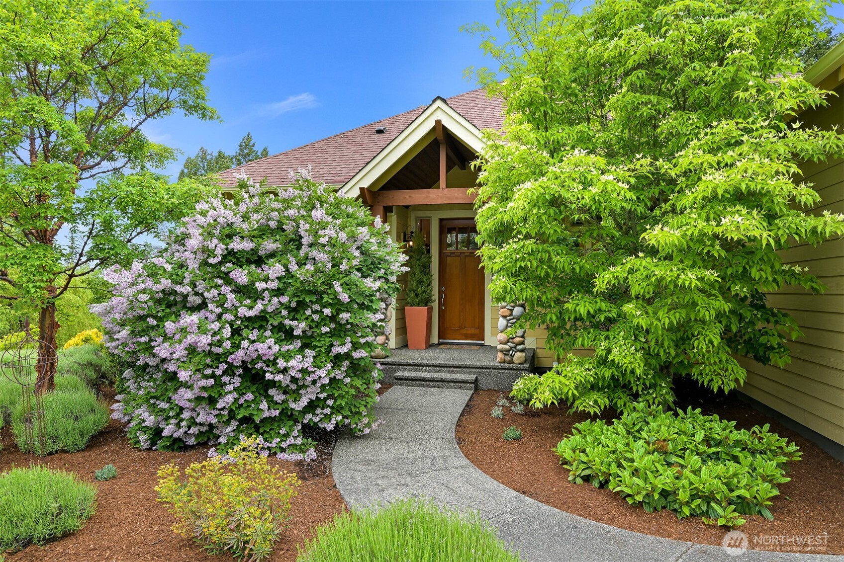 1910 40th Street Bellingham, WA 98229 - Photo 2 of 40 a house view with a garden