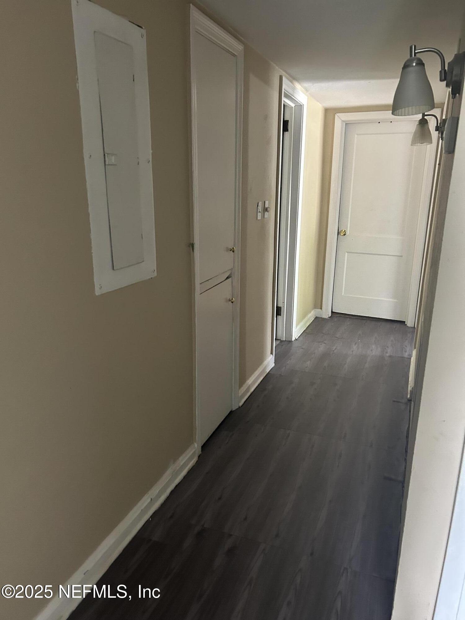 3173 St Augustine Road Jacksonville, FL 32207 - Photo 10 of 19 a view of hallway with wooden floor