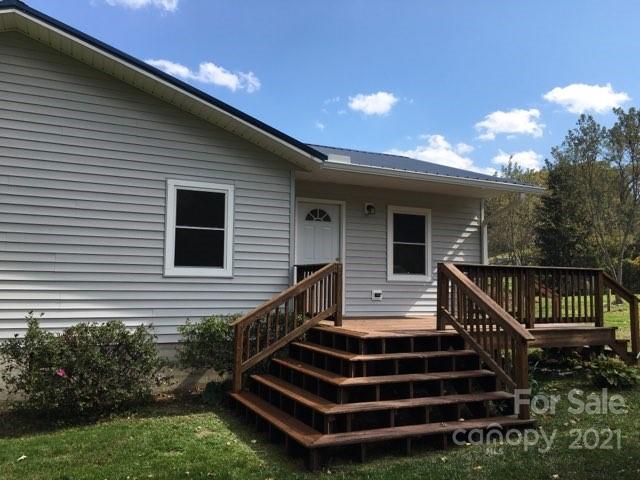 58 Ross Farm Road Waynesville, NC 28786 - Photo 2 of 29 a view of house with a yard and stairs
