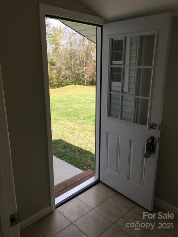 58 Ross Farm Road Waynesville, NC 28786 - Photo 13 of 29 a view of an empty room and window