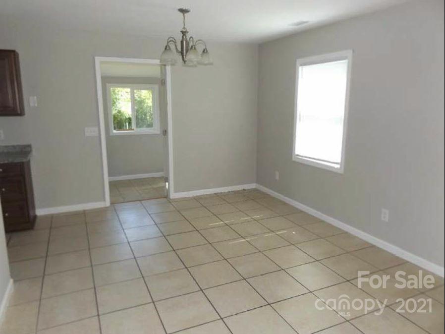 58 Ross Farm Road Waynesville, NC 28786 - Photo 17 of 29 an empty room with windows