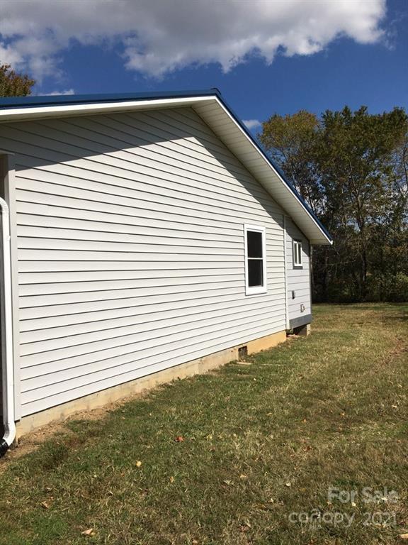 58 Ross Farm Road Waynesville, NC 28786 - Photo 4 of 29 a view of a house with a yard