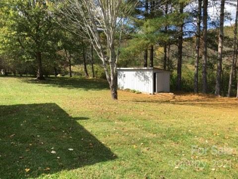 58 Ross Farm Road Waynesville, NC 28786 - Photo 7 of 29 a view of swimming pool with an outdoor space