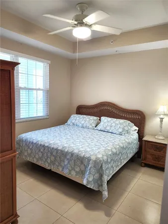 a bedroom with a bed and a closet