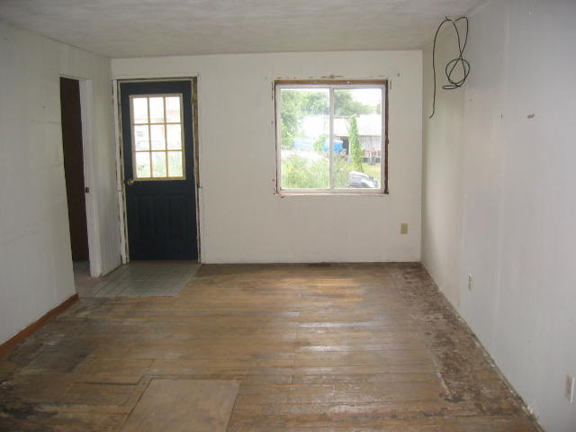 110 North Columbus Street Ransom, IL 60470 - Photo 2 of 7 an empty room with windows