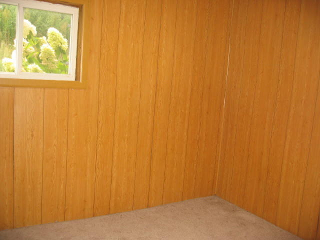 110 North Columbus Street Ransom, IL 60470 - Photo 3 of 7 a view of a small space with wooden floor