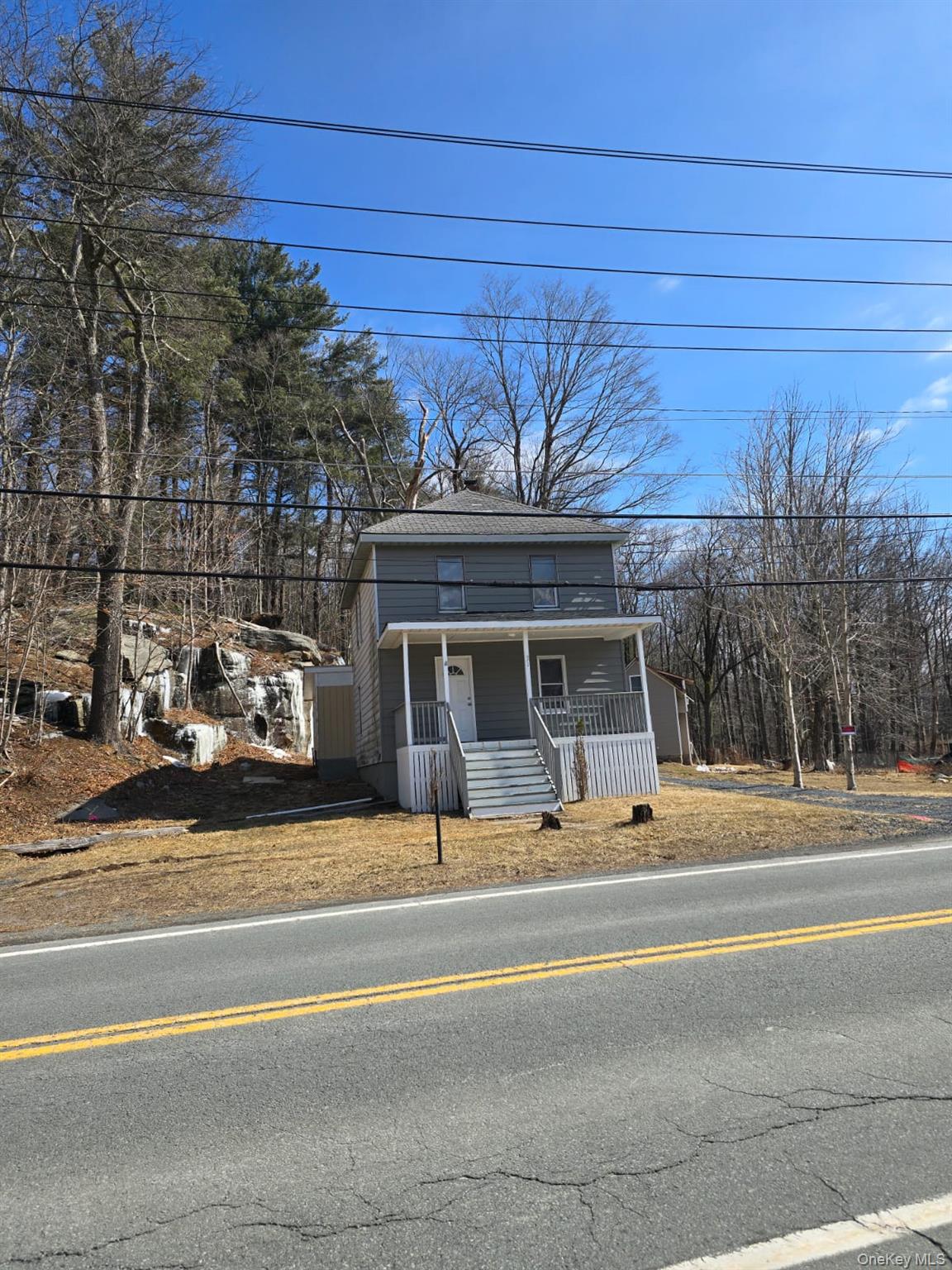 31 Cold Spring Road Monticello, NY 12701 - Photo 2 of 11 a view of a building and car parked on the road