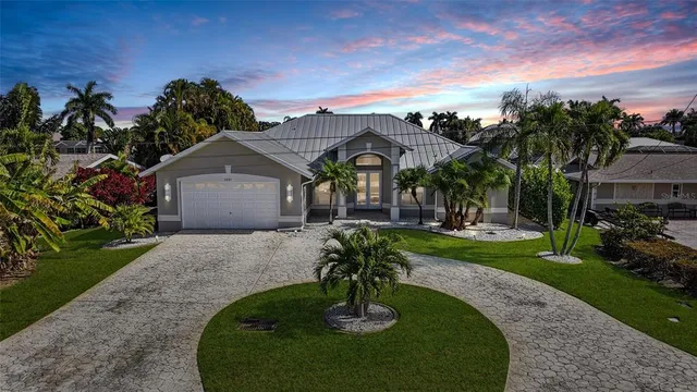 $899,000 | 5267 Stratford Court, Cape Coral, FL 33904