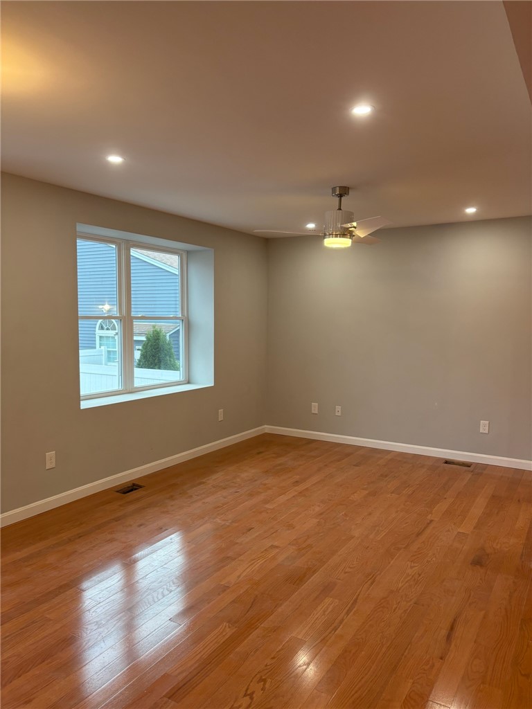 182 Avenue C, Unit S6 Woonsocket, RI 02895 - Photo 3 of 13 Spacious living and dining area with beautiful hardwood floors