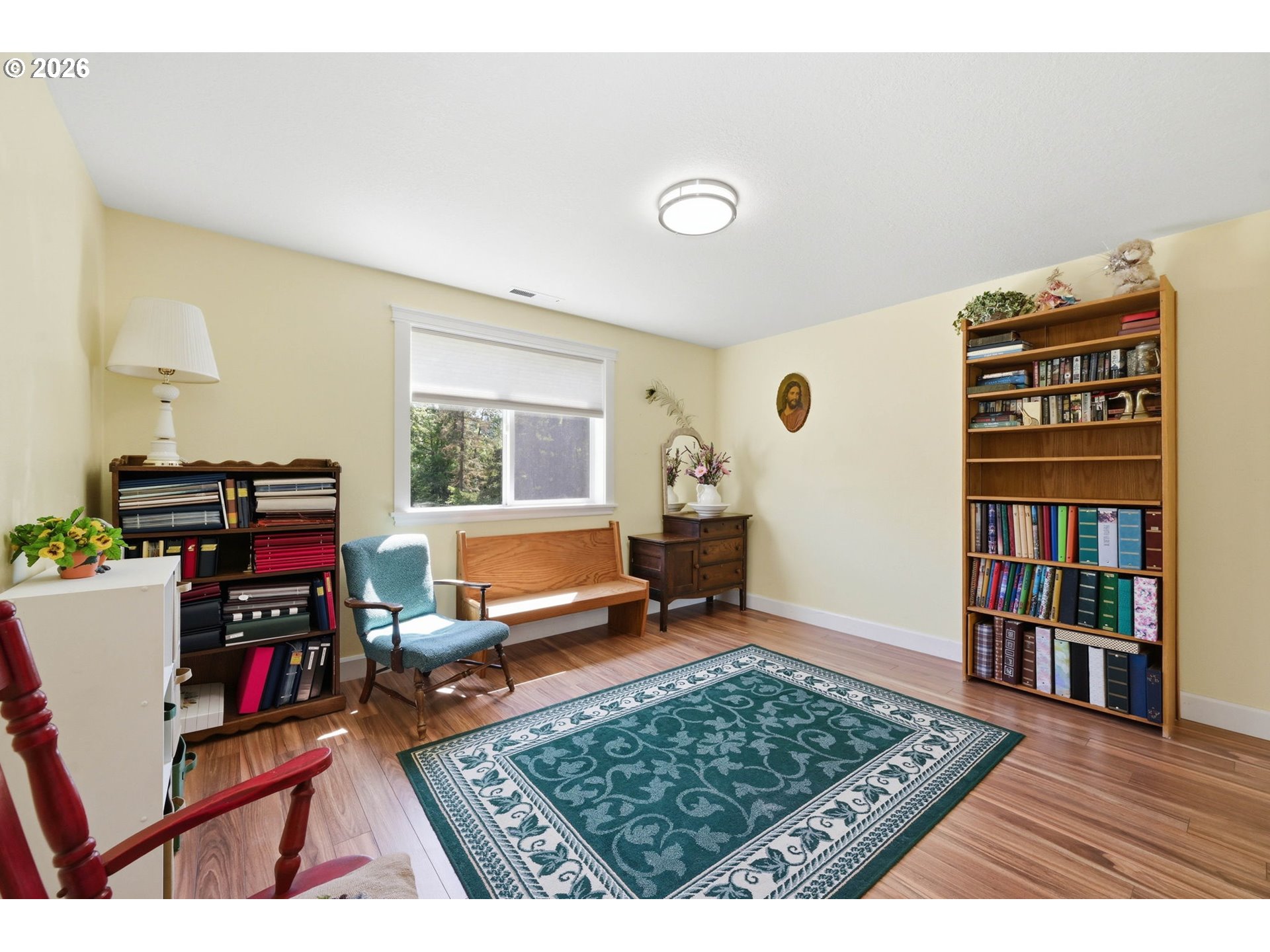 29778 Gimpl Hill Road Eugene, OR 97405 - Photo 28 of 43 a workspace with furniture and bookshelf
