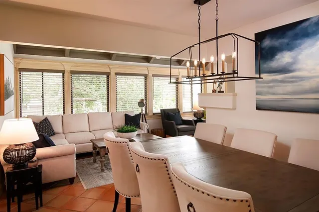 a view of a swimming pool with a patio