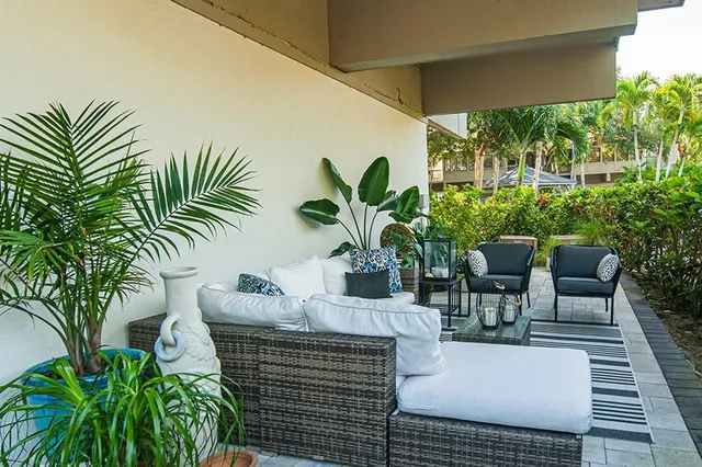 a view of living room with furniture and wooden floor
