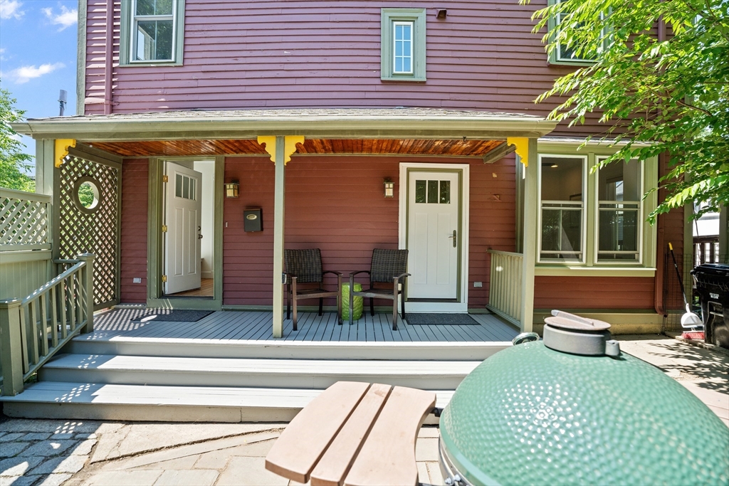 81 Franklin Street Brookline, MA 02445 - Photo 2 of 25 a view of a house with a patio