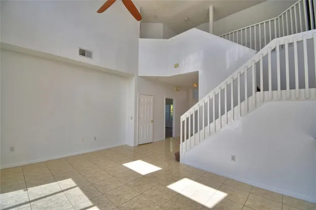 a kitchen with stainless steel appliances granite countertop a stove refrigerator and cabinets