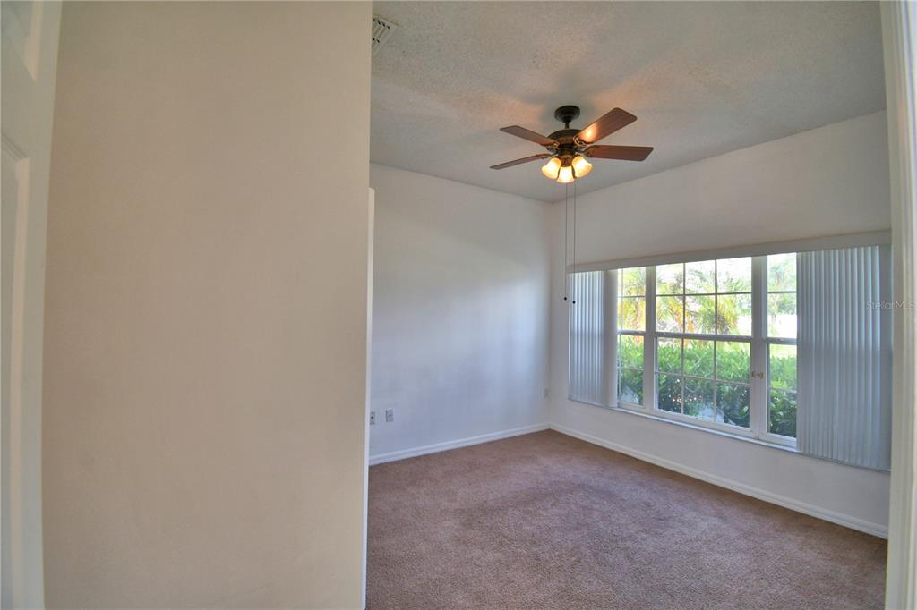 5368 Dahlia Reserve Drive Kissimmee, FL 34758 - Photo 24 of 83 a view of room with ceiling fan and window