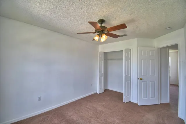 a view of a garden and swimming pool