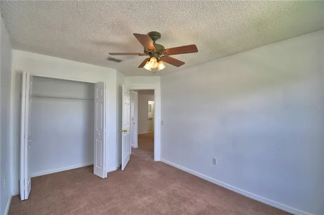 a view of a lake with a big yard