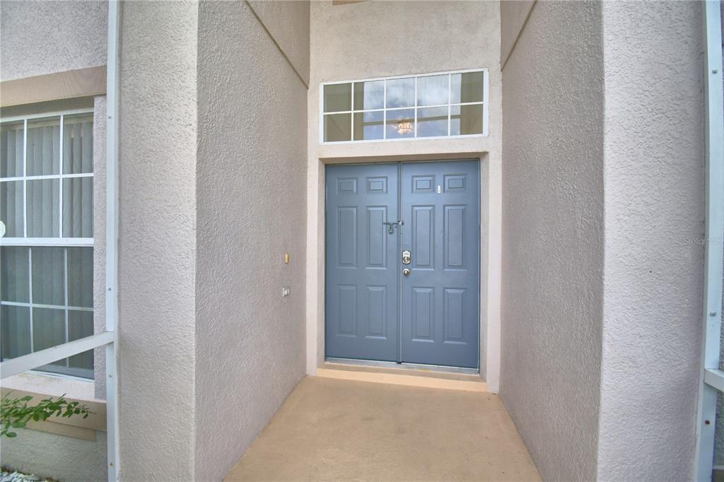 5368 Dahlia Reserve Drive Kissimmee, FL 34758 - Photo 5 of 83 a view of an empty room with windows