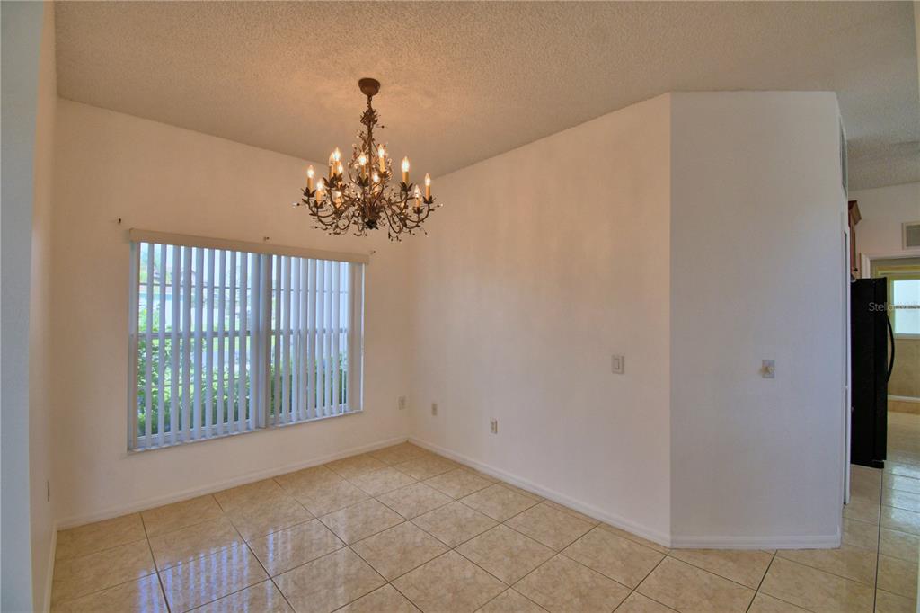 5368 Dahlia Reserve Drive Kissimmee, FL 34758 - Photo 7 of 83 a view of entryway with window