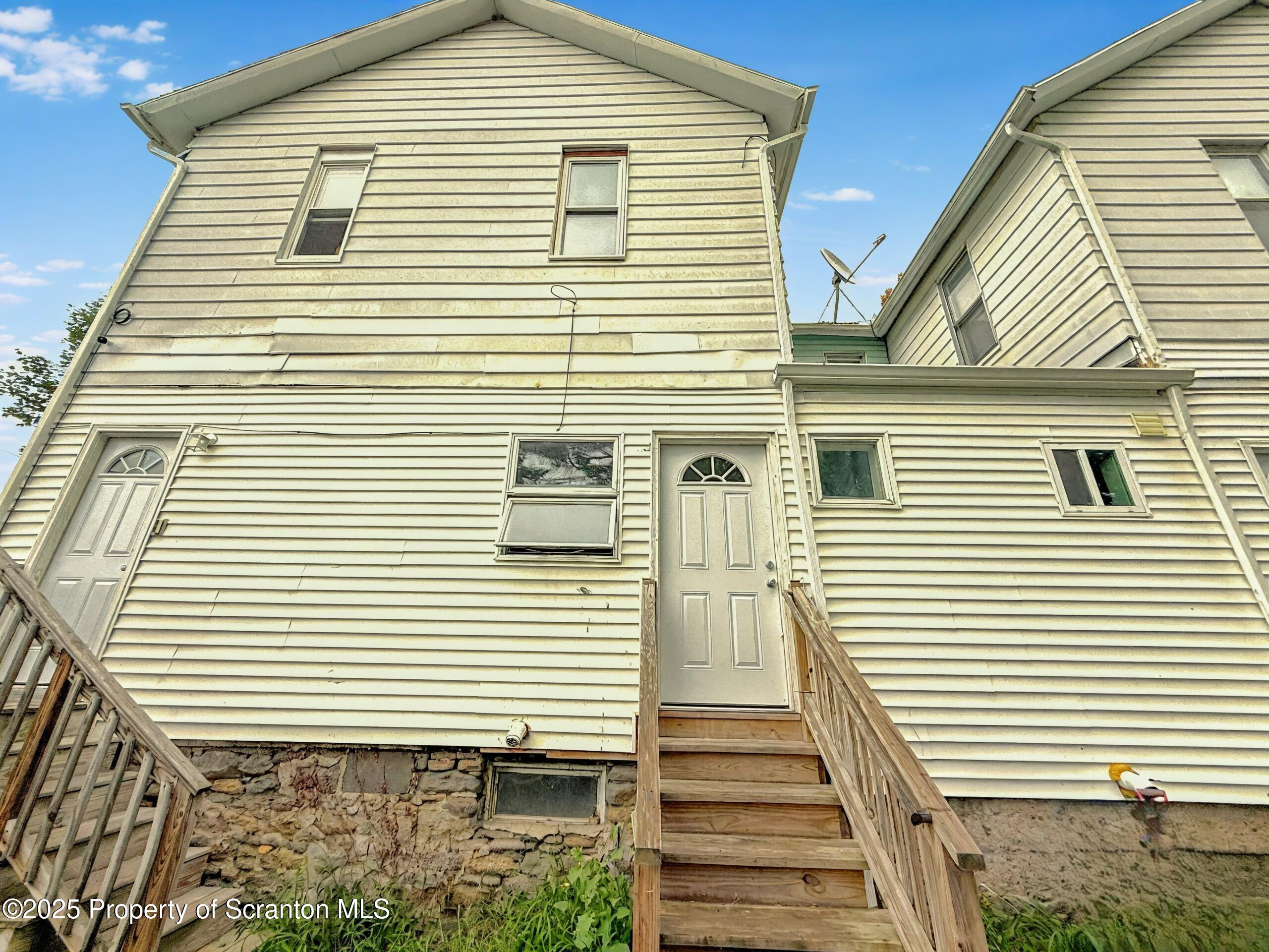 3 Miller Street Pittston, PA 18640 - Photo 14 of 15 a view of a house with a yard