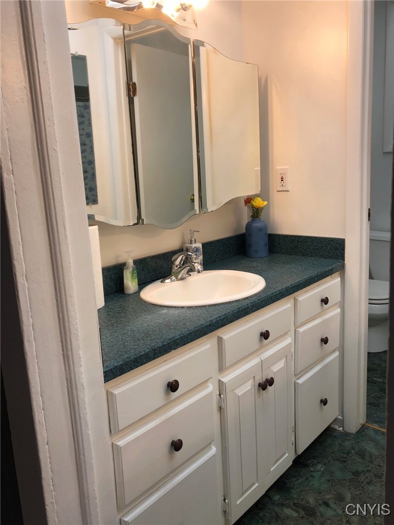 110 Spring Lane Syracuse, NY 13208 - Photo 19 of 40 Vanity entrance to the Bath Room