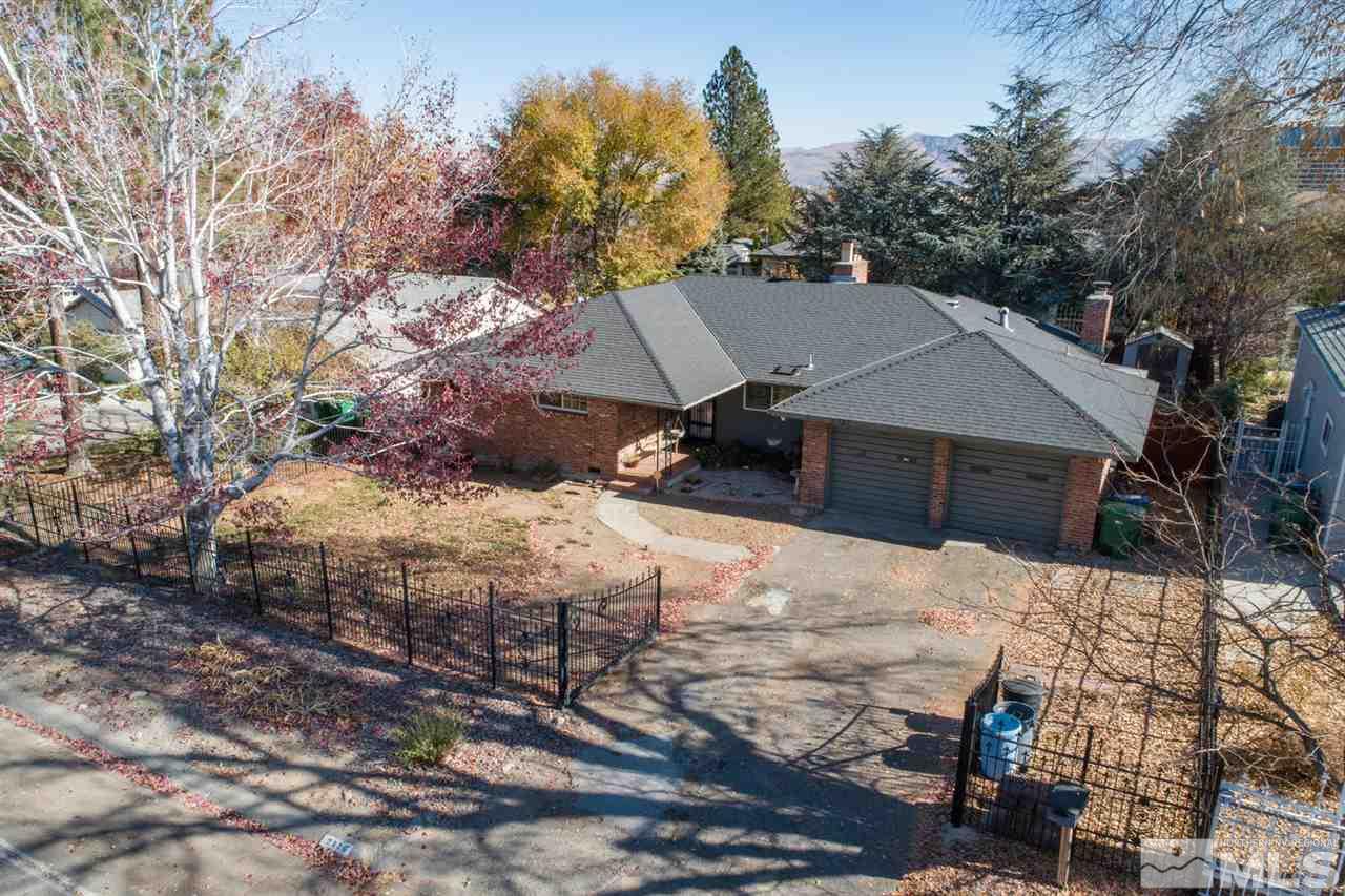 2320 Watt Street Reno, NV 89509 - Photo 2 of 25 a view of a house with a yard covered in snow
