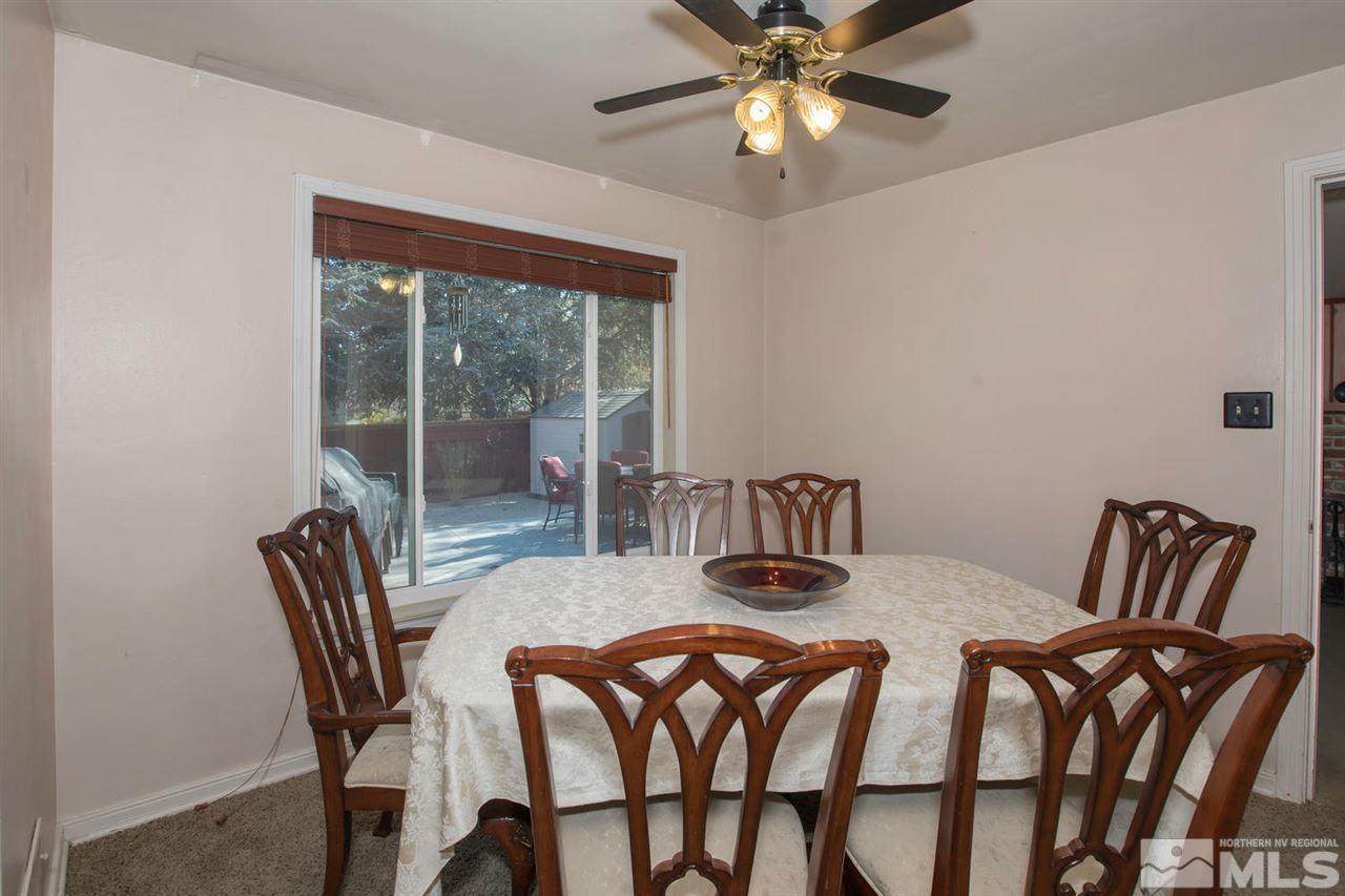 2320 Watt Street Reno, NV 89509 - Photo 8 of 25 a view of a dining room with furniture window and outside view