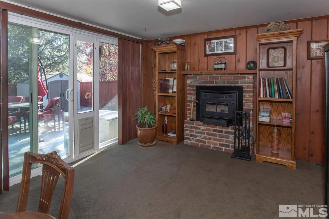 2320 Watt Street Reno, NV 89509 - Photo 9 of 25 a living room with furniture and a fireplace