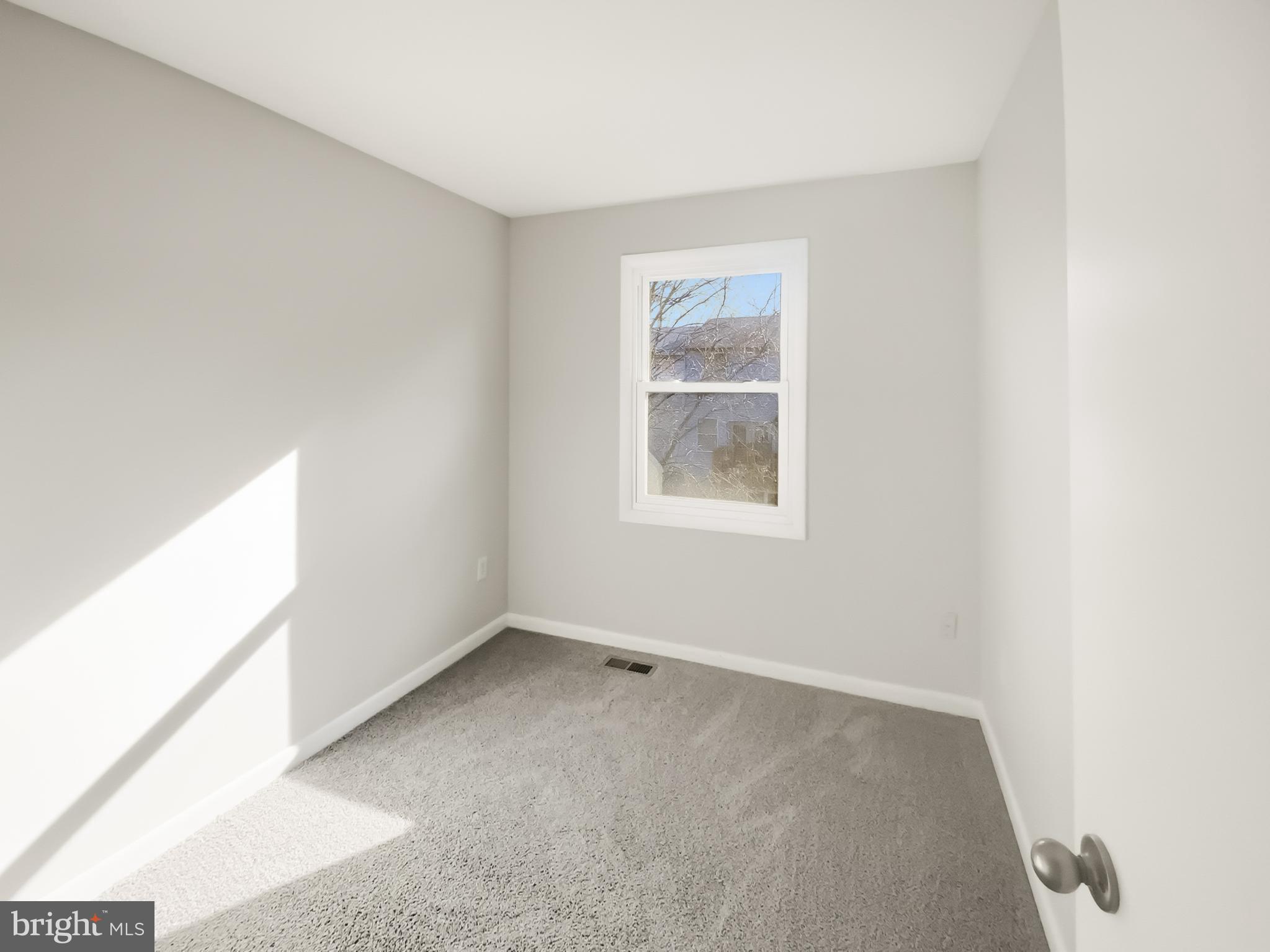 5132 Redbud Road Fredericksburg, VA 22407 - Photo 11 of 19 an empty room with windows