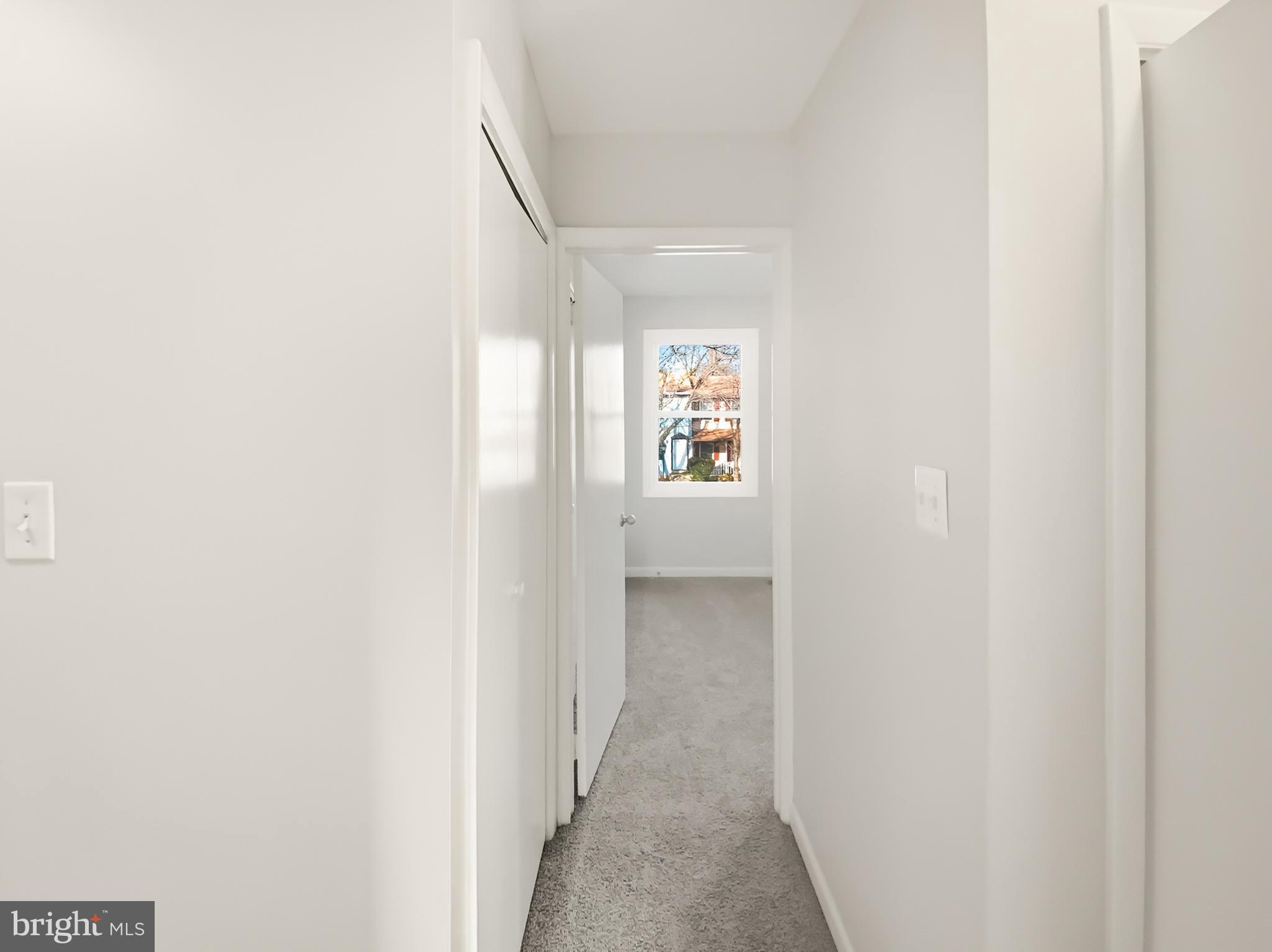 5132 Redbud Road Fredericksburg, VA 22407 - Photo 15 of 19 a view of a hallway with windows