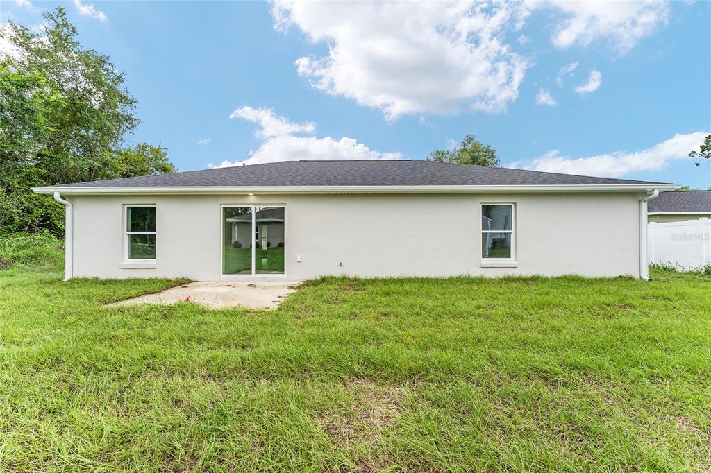 319 Fisher Road Ocklawaha, FL 32179 - Photo 45 of 48 a house view with backyard space