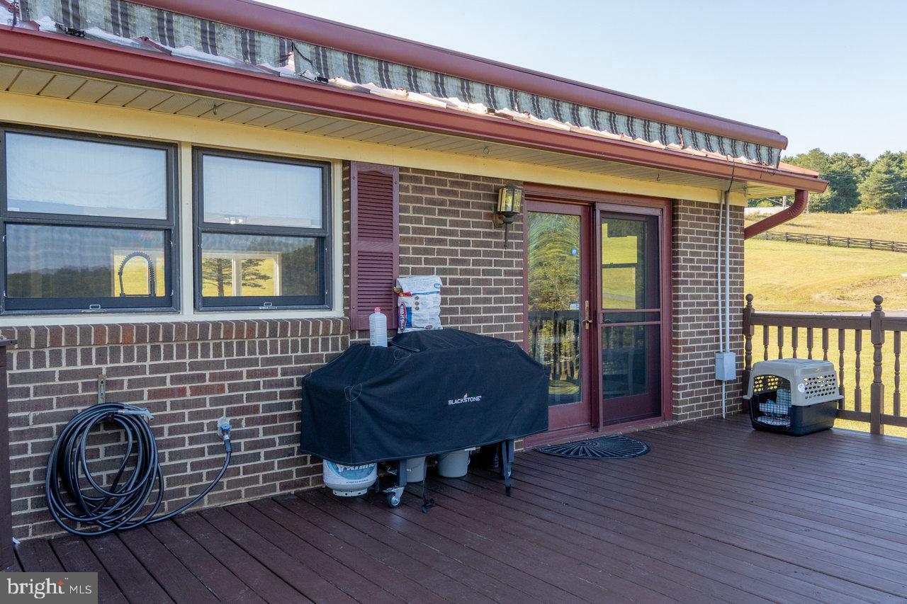 212 Whitacre Road Gore, VA 22637 - Photo 12 of 100 Charming deck with scenic countryside views.