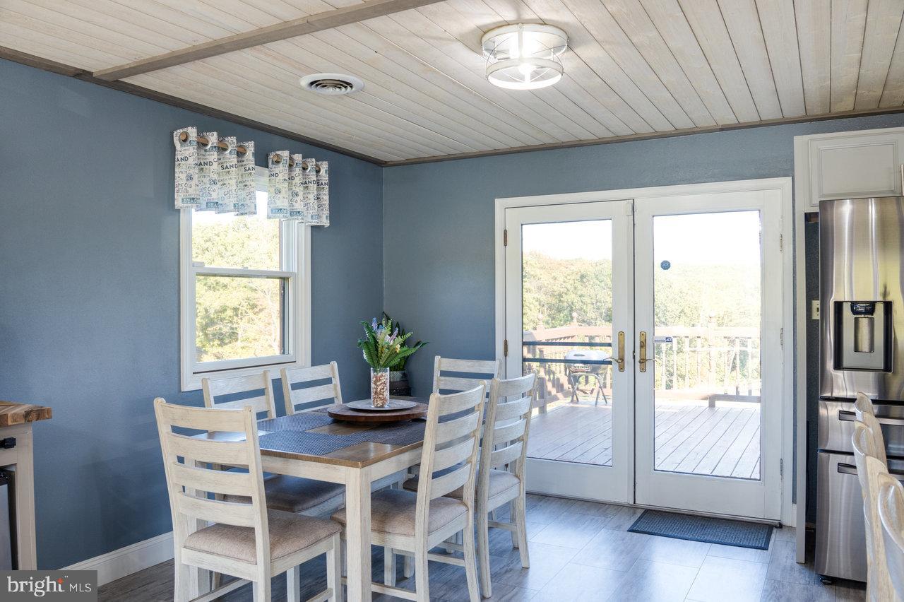 212 Whitacre Road Gore, VA 22637 - Photo 13 of 100 Bright and airy dining space with nature views.