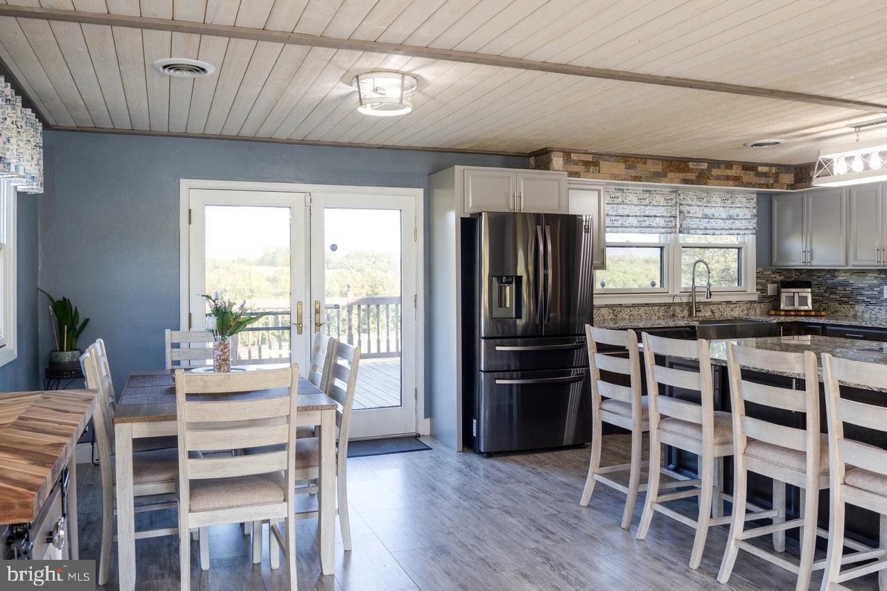 212 Whitacre Road Gore, VA 22637 - Photo 17 of 100 Modern kitchen with serene outdoor views.